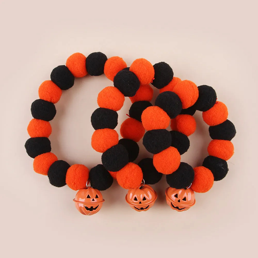 Halloween cat collar with orange pumpkin design and trick or treat text for festive pet costumes