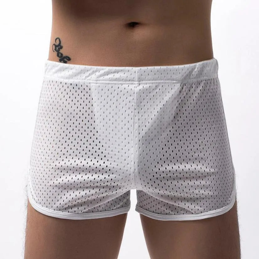 Men's cotton boxer shorts in multiple colours on a mid-waist fit model