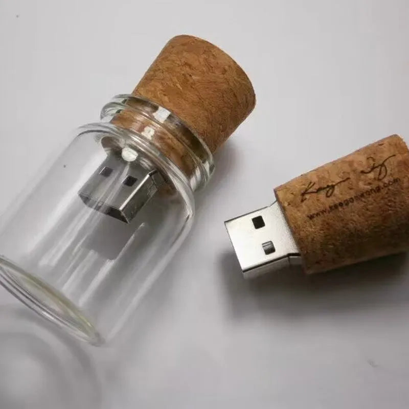 Transparent bottle-shaped USB flash drive with bamboo wood stopper showing drift bottle design