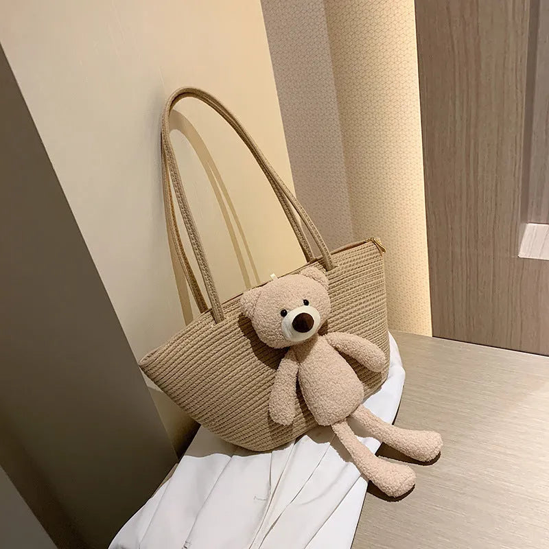 Cotton and linen woven shoulder bag in dumpling shape with three-dimensional pocket and double straps