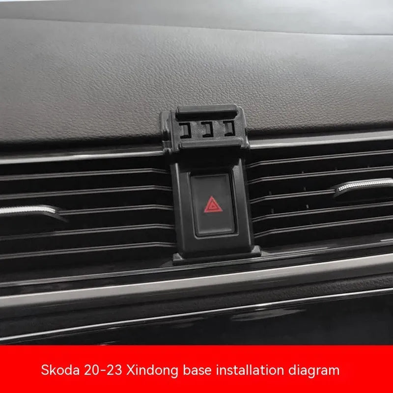 Snap-on car phone bracket mounted on Škoda air vent for mobile phone