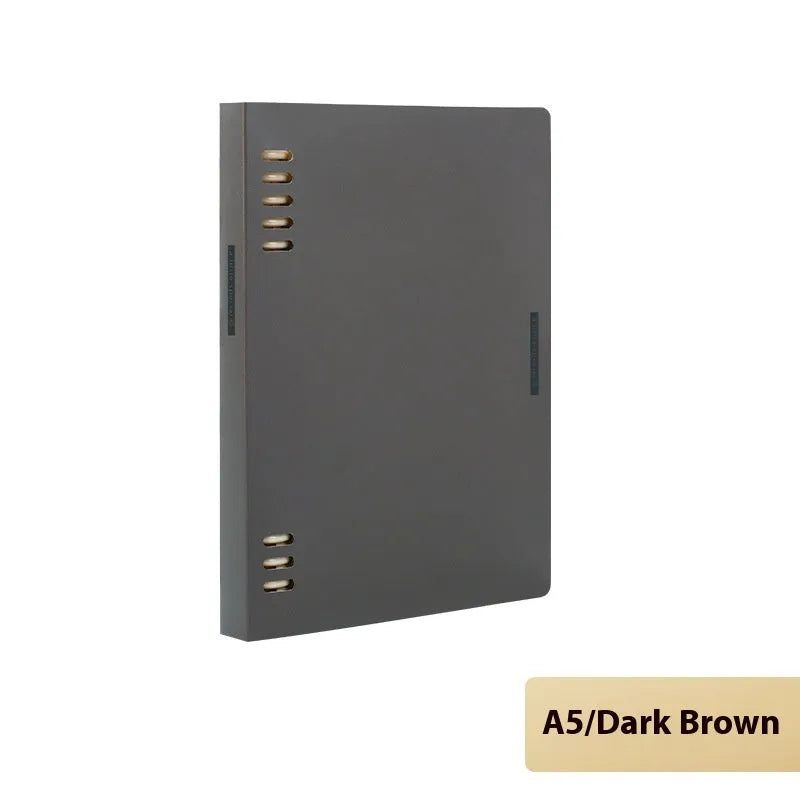 Loose-leaf spiral notebook with PP cover open, showing raw wood pulp pages in A5 or B5 size.