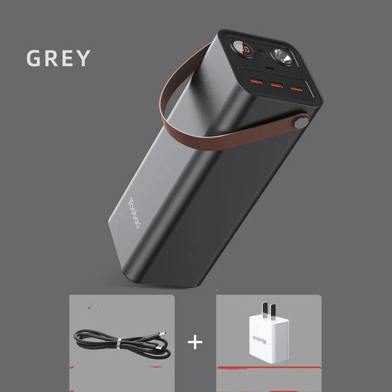 Black portable power bank with 20000mAh capacity and solar panel for emergency outdoor charging.