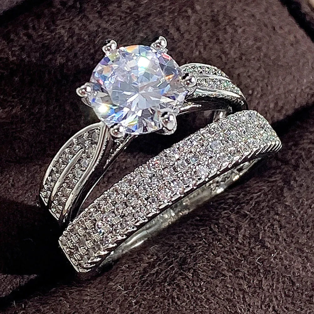 White gold colour geometric wedding ring bracelet with round elements on size chart showing UK sizes 5-11