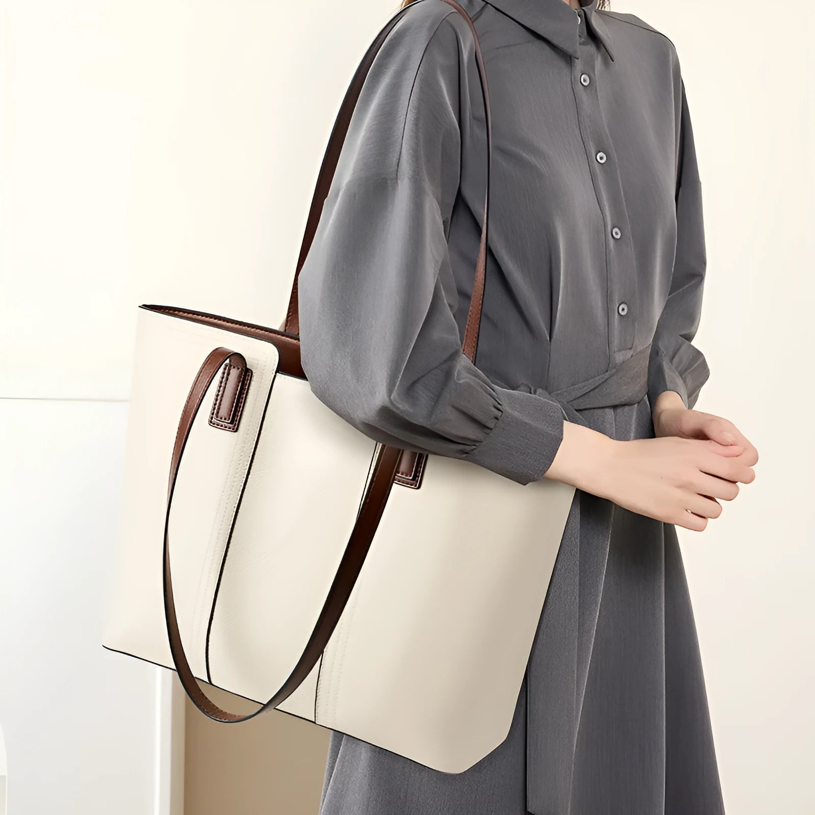 Women's black genuine leather commuter shoulder bag with multiple internal compartments