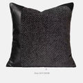 Modern minimalist plaid bed runner set with blanket, pillowcase, and round leather pillow on a bed