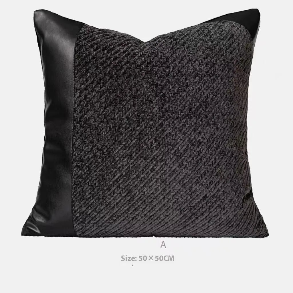 Modern minimalist plaid bed runner set with blanket, pillowcase, and round leather pillow on a bed