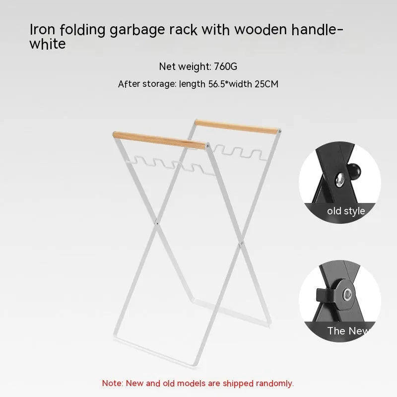 Black iron folding trash storage rack with wooden handle mounted on a wall.