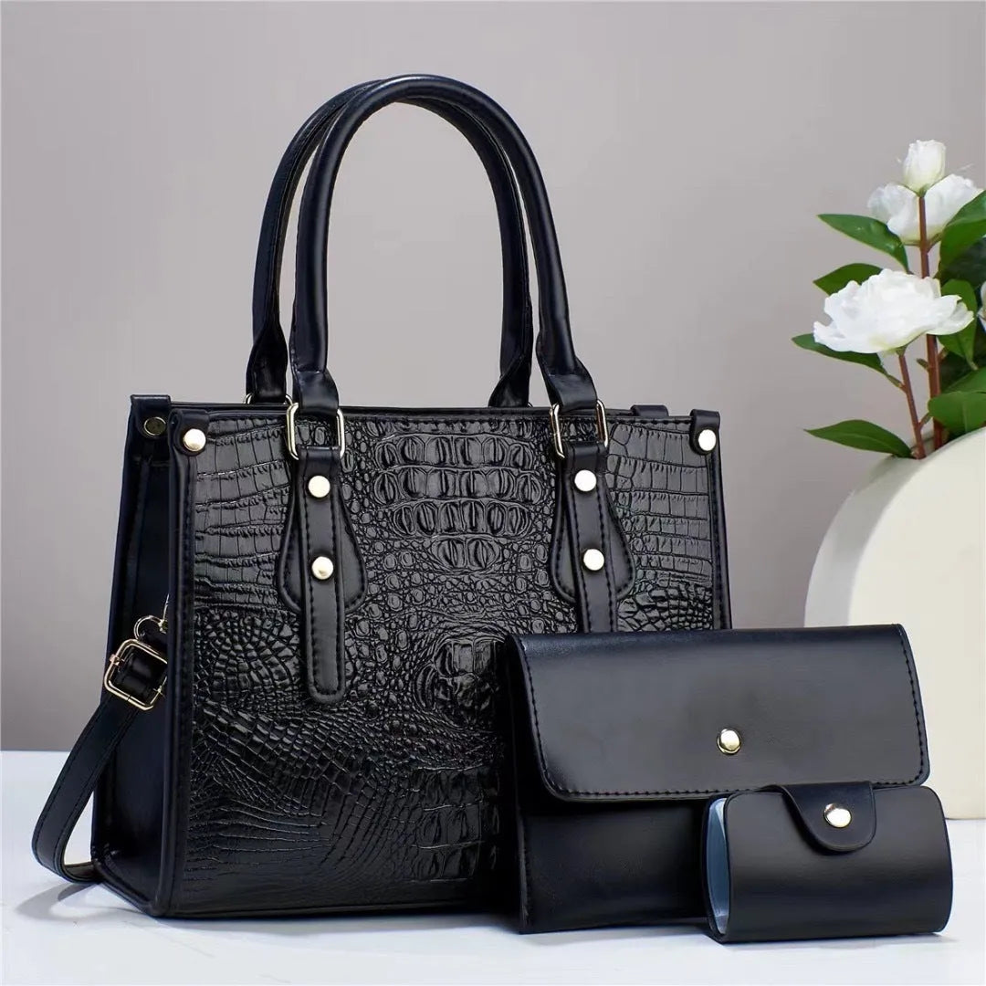 Women's textured PU leather three-piece travel bag set showing crossbody bag, wallet and card holder in coordinated colour
