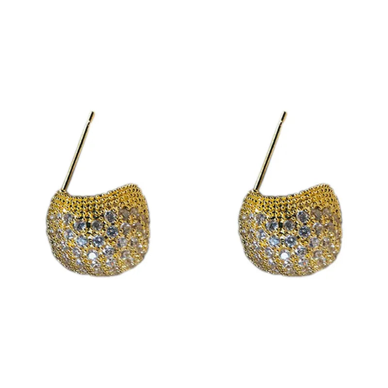 Geometric drop ear clips with diamond-cut golden beans in gold or white colour