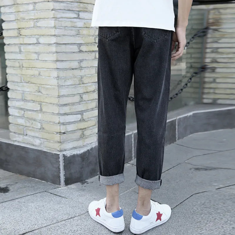 Men's loose straight leg harem style jeans in black or blue cotton fabric
