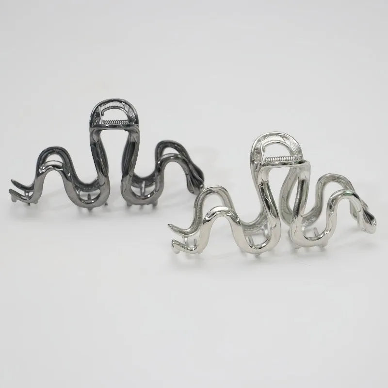 Metal Slytherin serpentine snake hair barrette in silver or gun black, 10.5 cm long.