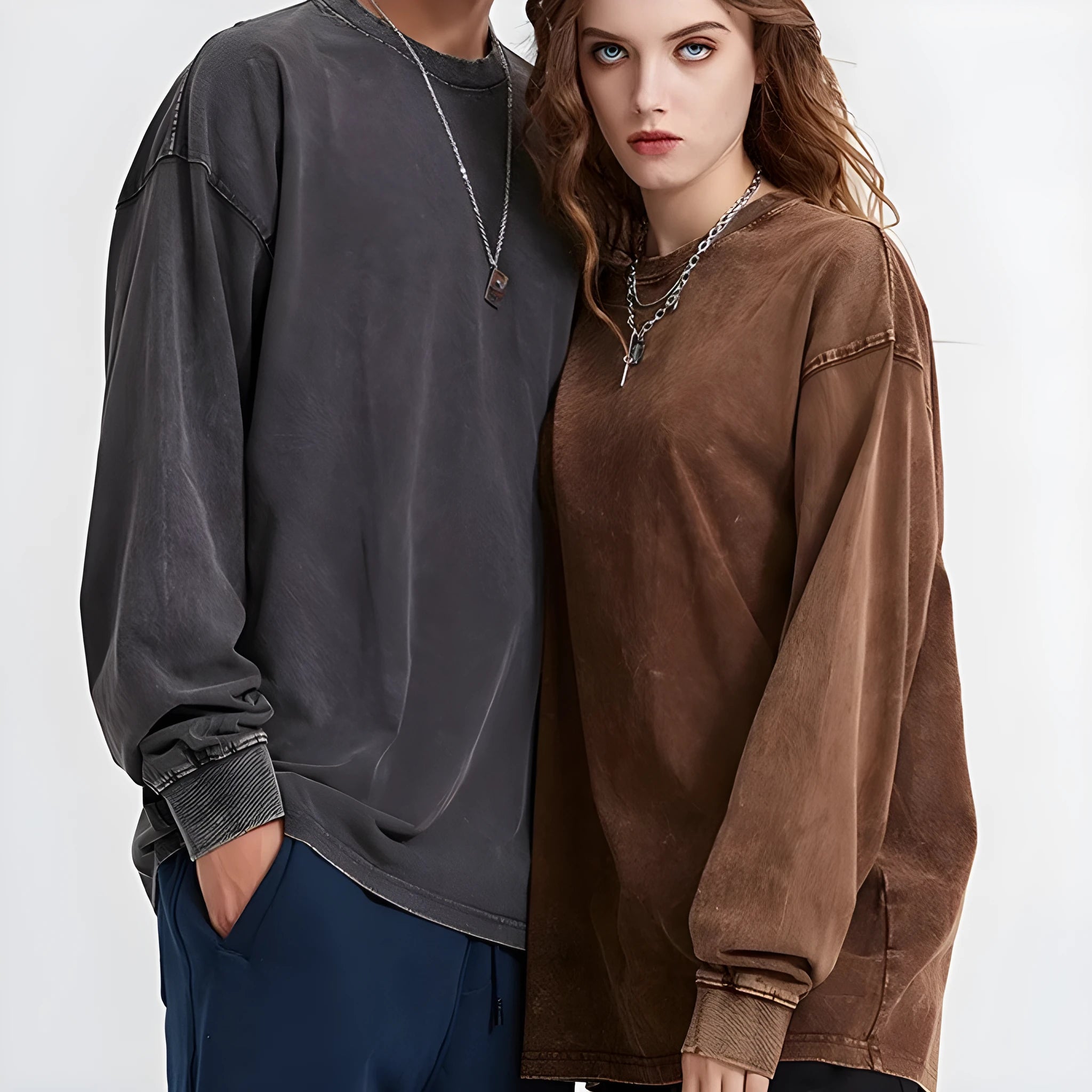 Man wearing a loose fit batik black washed vintage cotton long sleeve pullover.