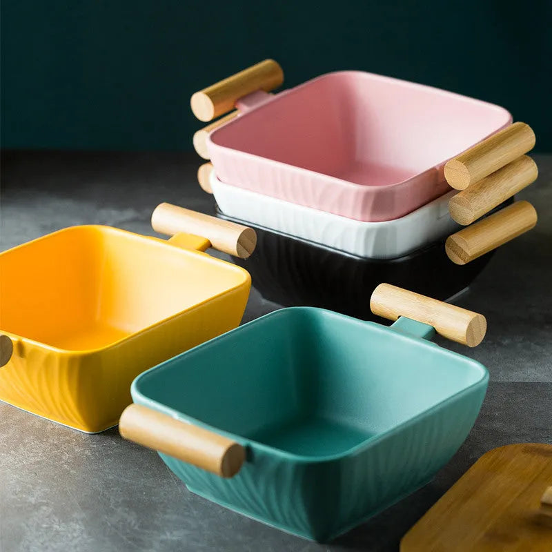 Porcelain ceramic bowl with lid in irregular shape design, shown in available colour options.