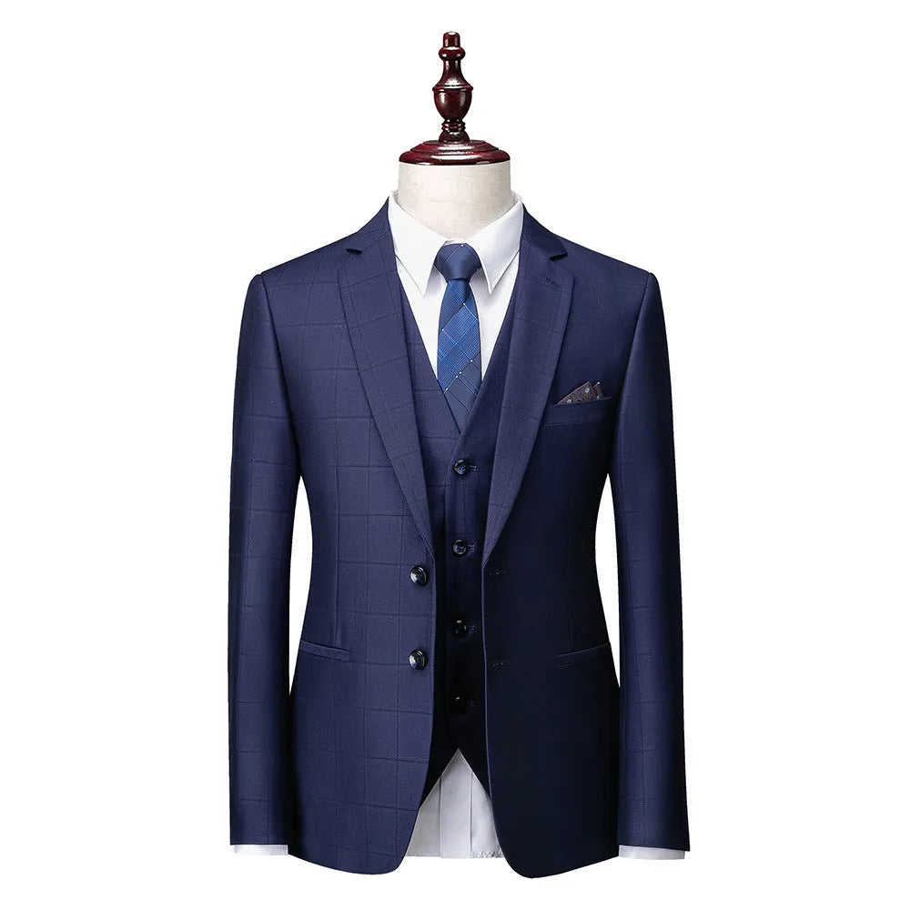 Men's navy blue slim fit three-piece suit with vest, jacket, and trousers for business casual occasions