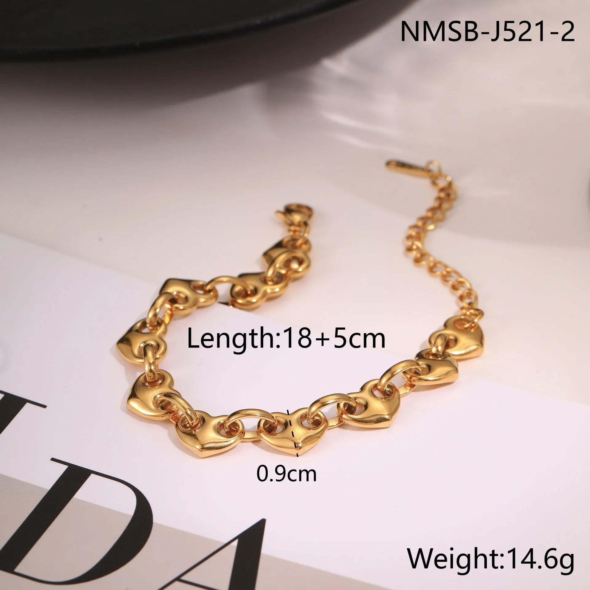 Women's hollowed-out heart bracelet in stainless steel with geometric design and gold plating