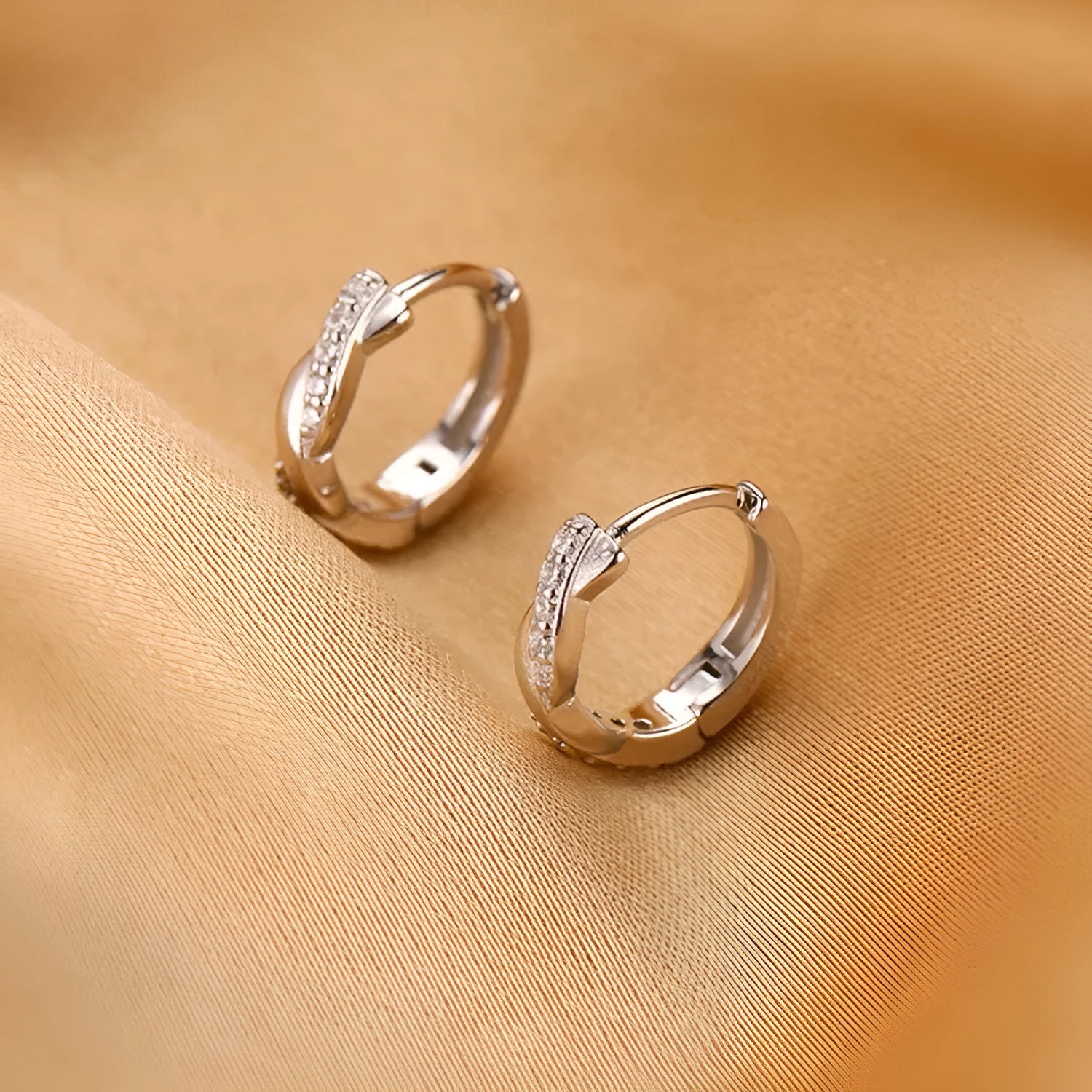 Geometric interwoven hemp rope earclip earrings with round bead accents in gold or silver colour