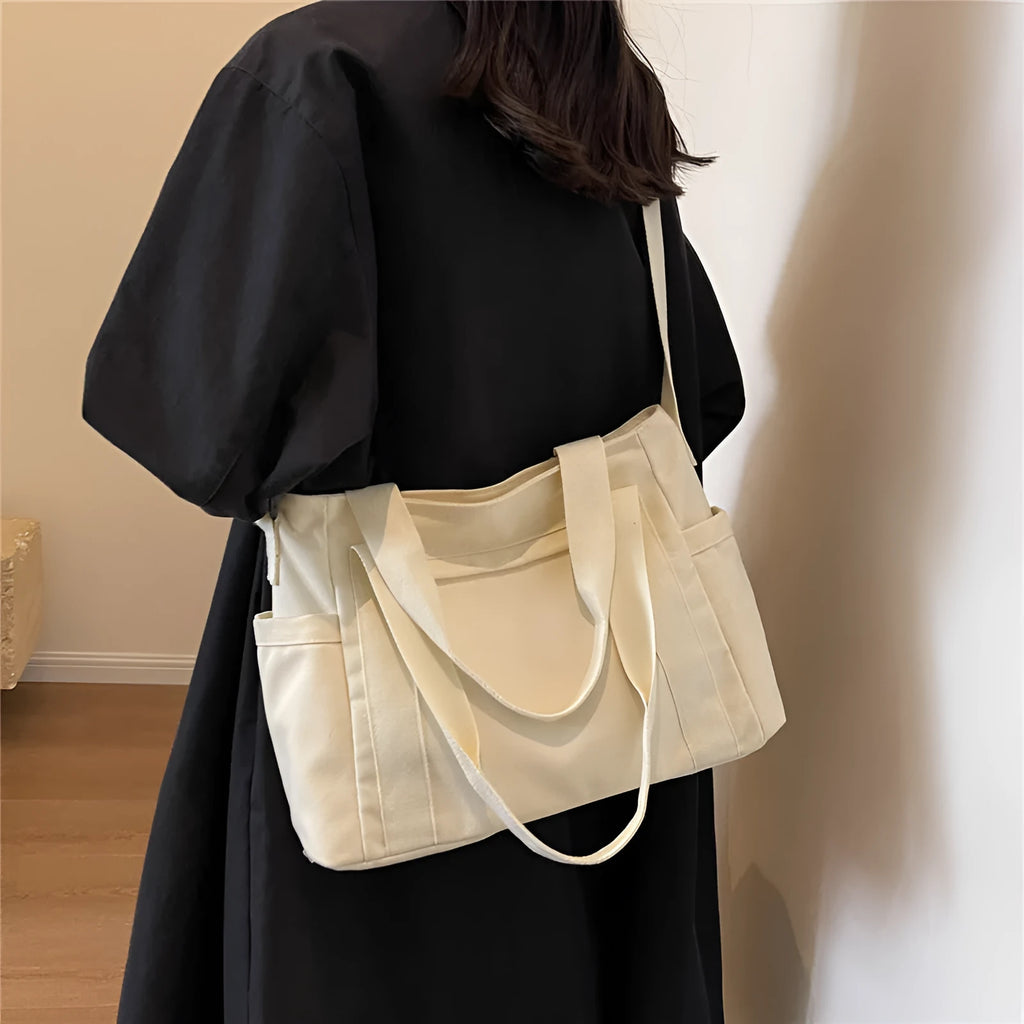 Large capacity shoulder canvas tote bag in solid colour with sandwich pocket and mobile phone compartment