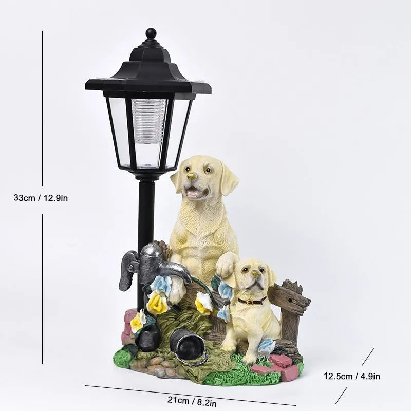Solar hexagonal garden lamp with decorative resin figurine on plastic base for outdoor pathway lighting