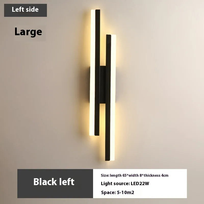 Modern Scandinavian minimalist LED wall light with acrylic shade in black or gold finish.
