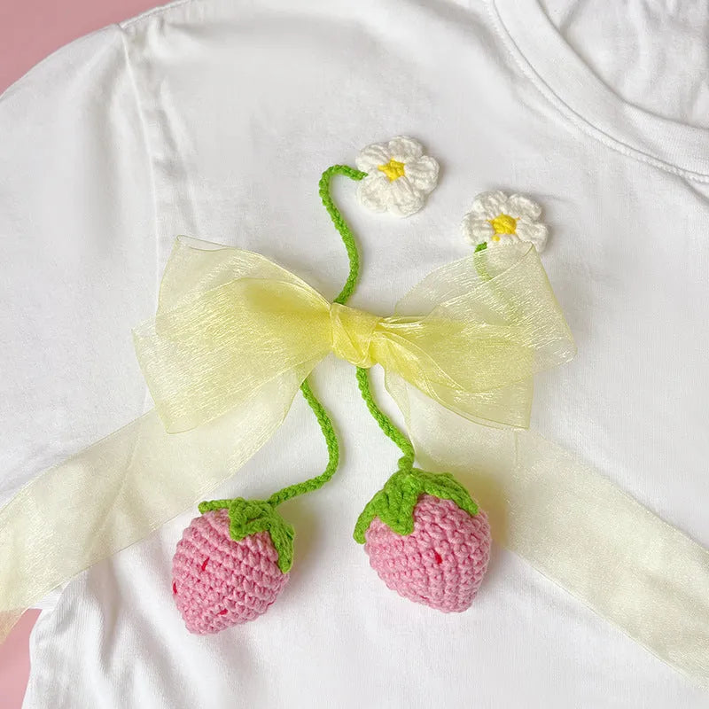Handmade wool crochet strawberry pendant necklace with woven detail on 35cm cord