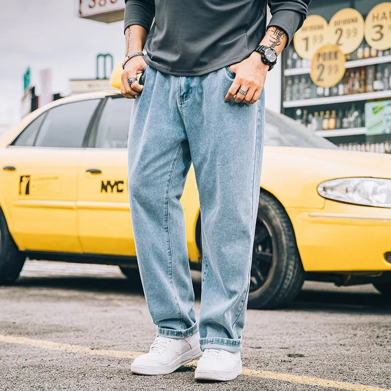 Men's loose straight casual jeans in dark blue with mid-waist fit and zipper fly