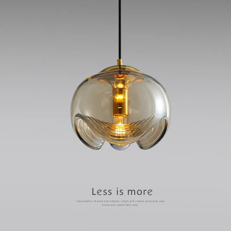 Modern minimalist glass pendant chandelier with a 25cm diameter, shown in transparent, amber, and smoky grey colour options.