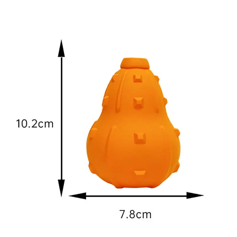 A long, brown, natural rubber stuffable dog toy for small medium breeds, shown with a treat inside.