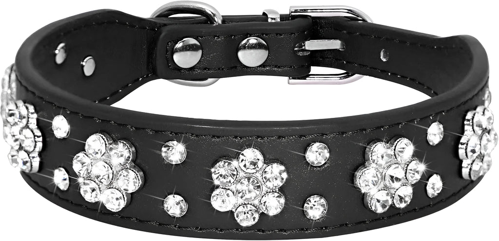 PU leather dog collar with rhinestone flower studs in black, showing metal D-ring and adjustable eyelets.