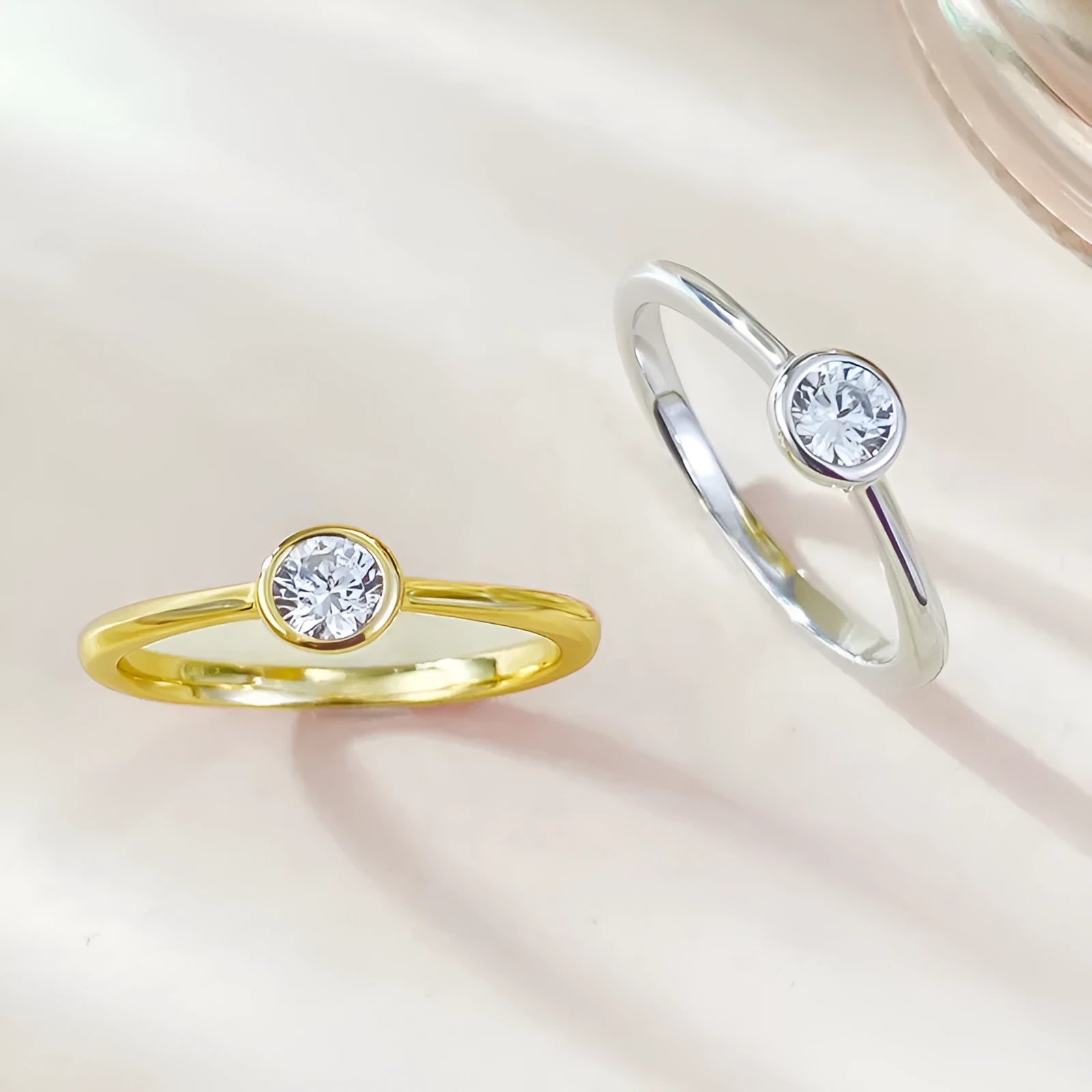 Minimalist silver crown ring with line design in gold or platinum finish on a size guide