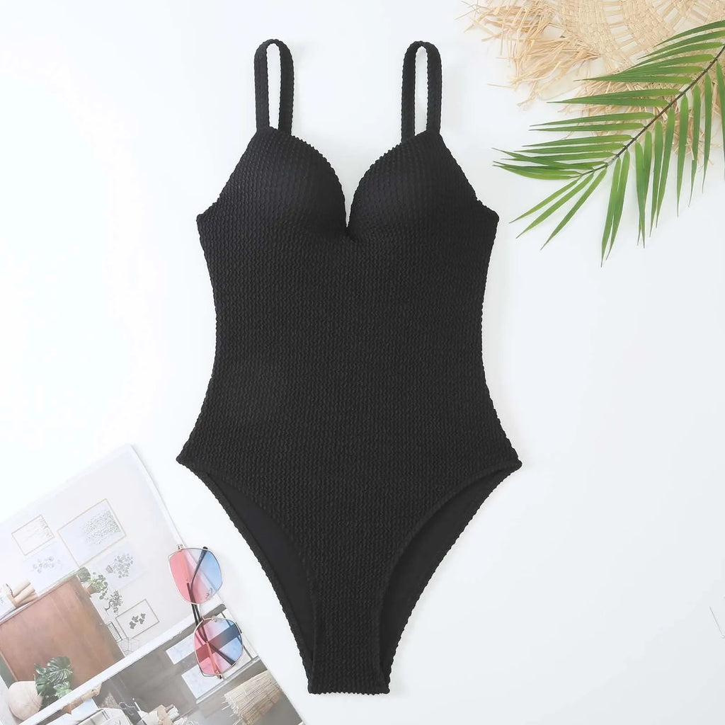 Women's sleeveless one-piece swimsuit with sunk stripe pattern in polyester fabric