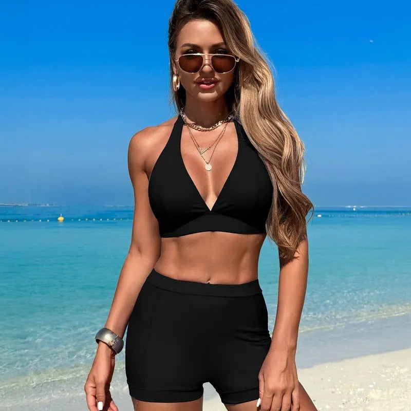 Women's black split bikini swimsuit made of nylon with polyester lining.