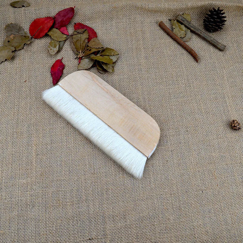 Wool fibre art brush for mounting paste and shading in picture colour.