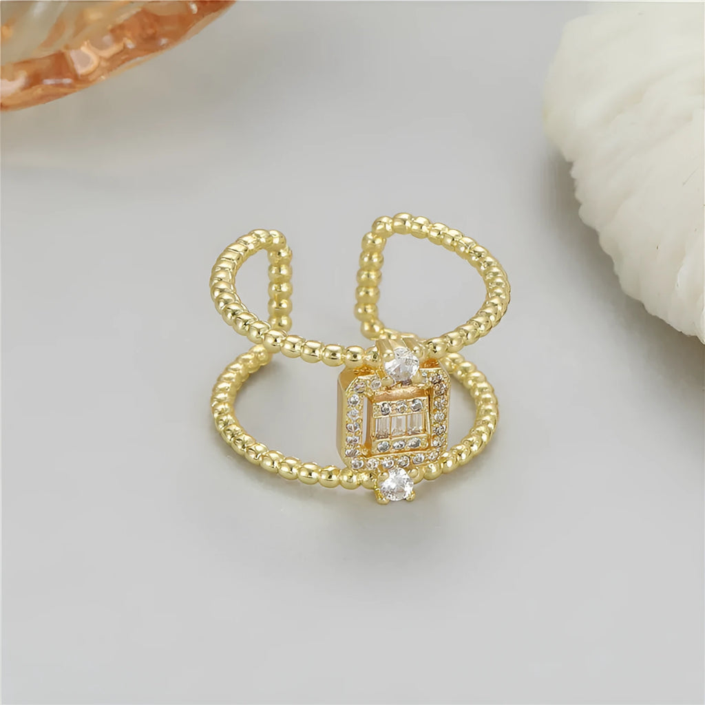 Adjustable asymmetric open ring in 14K gold-plated copper, colour H12813.
