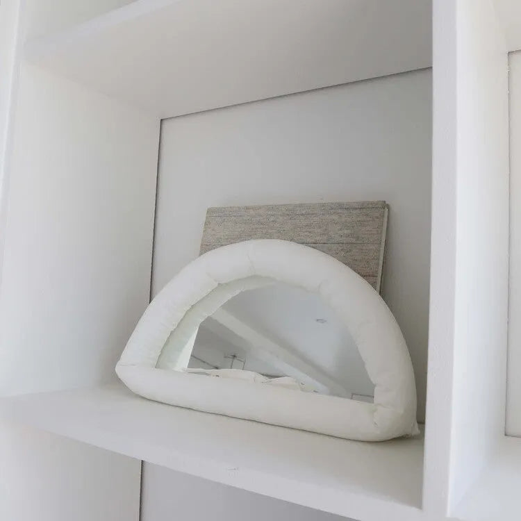 Hanging fabric mirror with soft cotton padding for photography backgrounds in solid colours