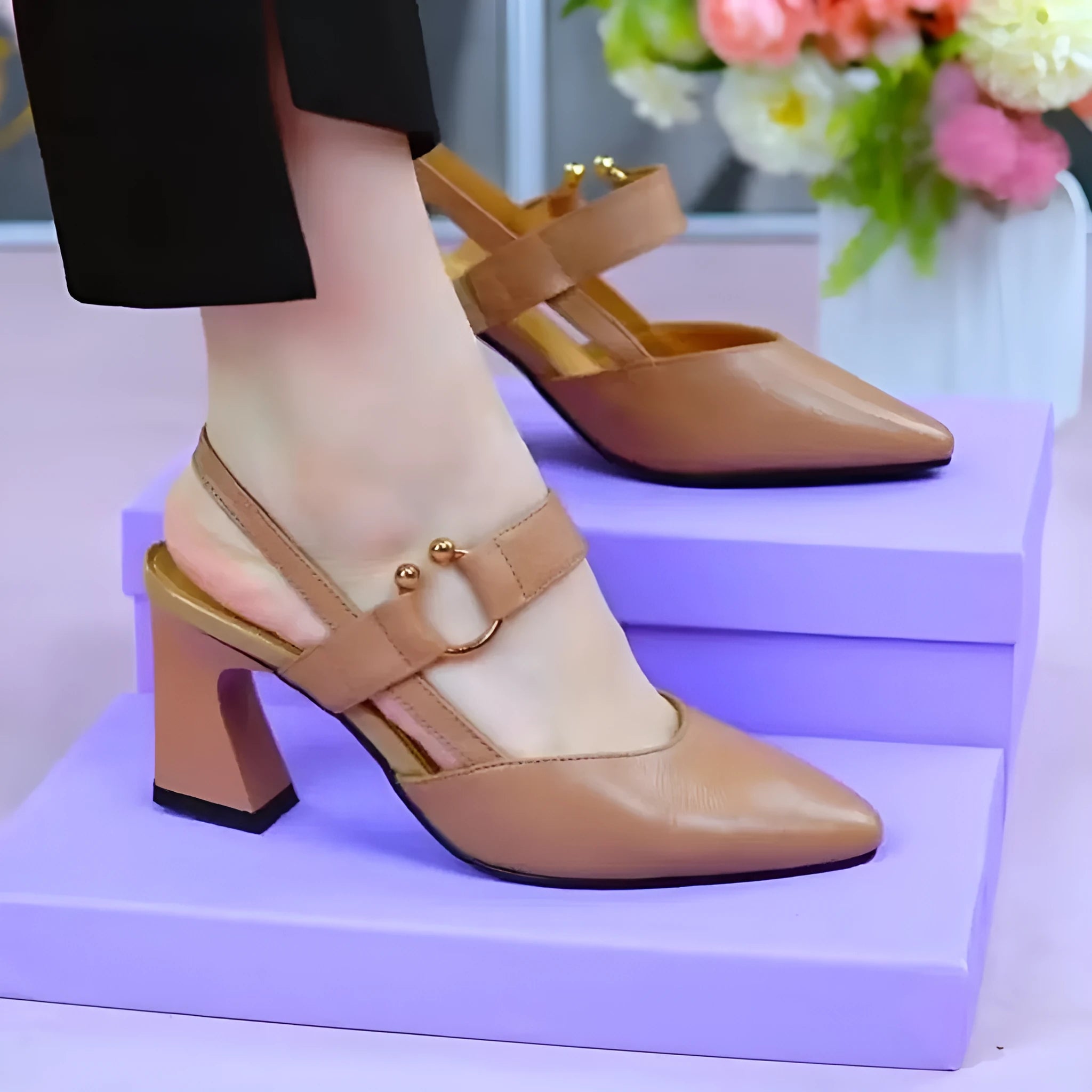 Women's apricot coloured pigskin leather sandals with a closed toe, backless design and a chunky heel.