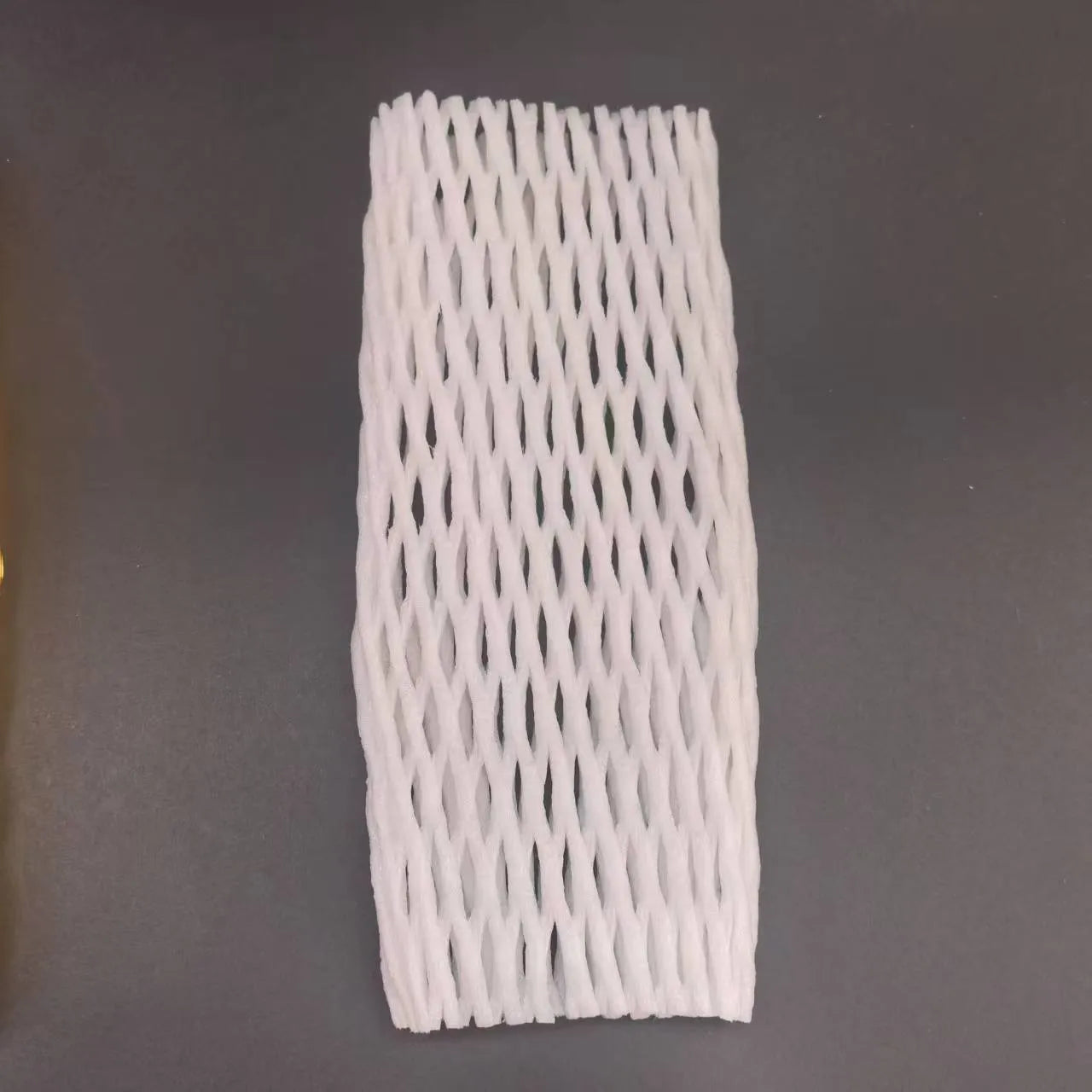 White foam fruit protective net cover showing shockproof design for produce protection