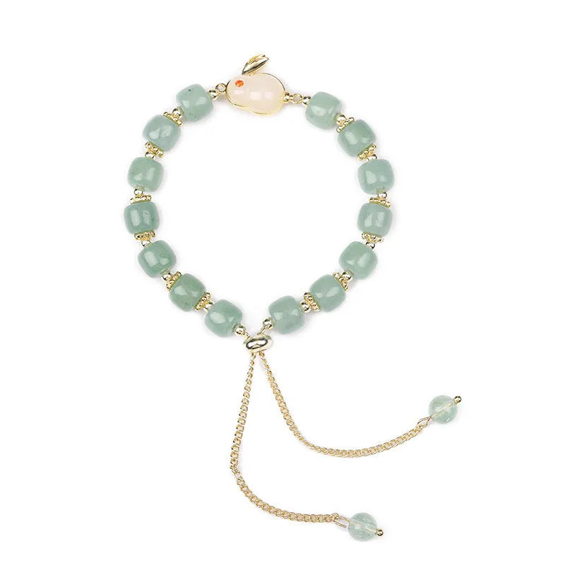 Rabbit charm bracelet with green aventurine or strawberry quartz stones on gold-plated copper