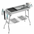Stainless steel portable barbecue oven with charcoal grill and cooking accessories