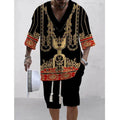 Man wearing a loose fit casual short sleeve top and matching shorts suit set