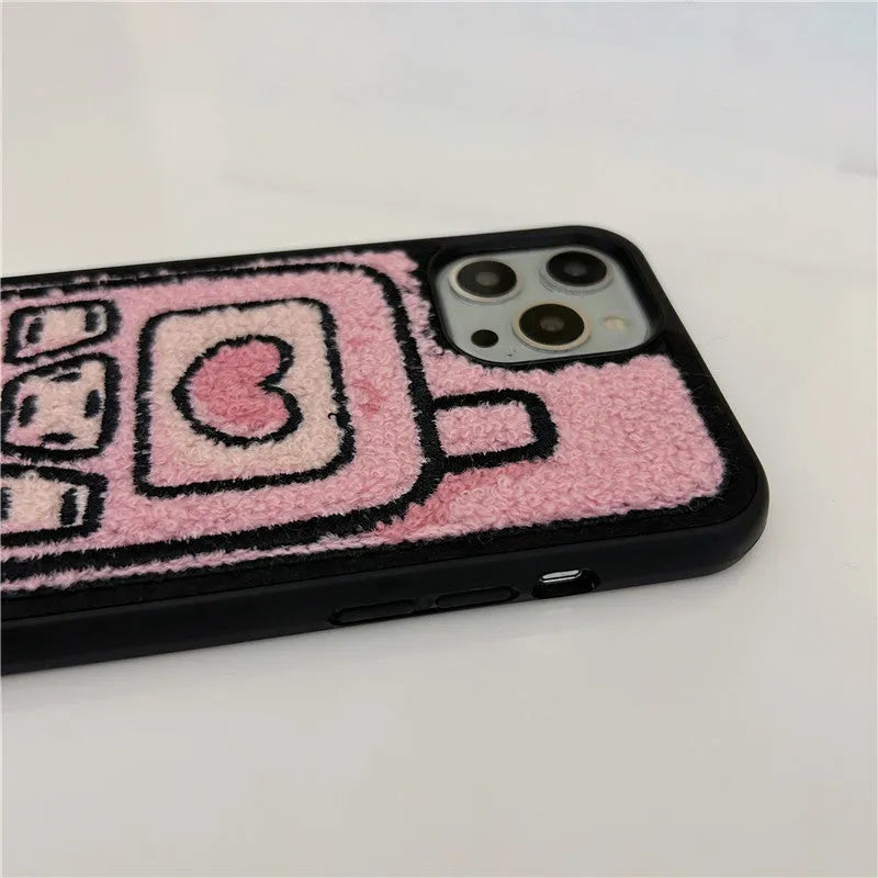 Pink towel embroidered TPU phone case for iPhone showing textured back surface and camera cutouts