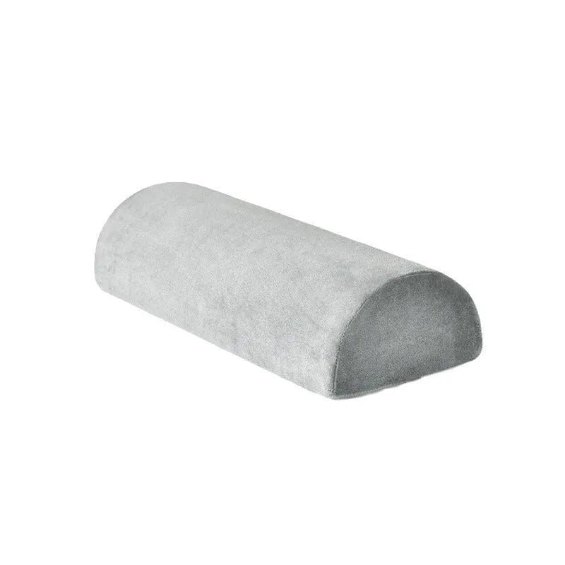 Gray crystal velvet half-cylinder foot pillow with memory foam, 42x18x10cm, on a desk