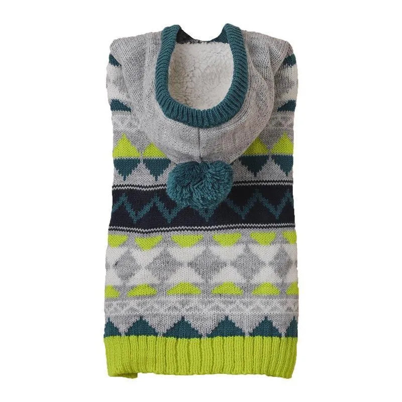 Green diamond pattern knit sweater on a small dog, showing classic design and soft acrylic fabric.