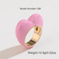 Three-dimensional heart-shaped enamel ring in a choice of colours on a zinc alloy band.