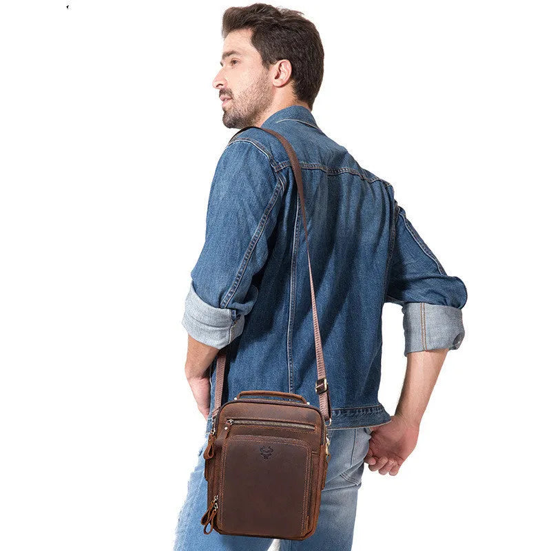 Men's brown Crazy Horse leather retro style crossbody bag with sewing line details.