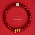 Handmade cinnabar snake year bracelet with Zodiac animal design, showing snake beads in traditional Chinese style.