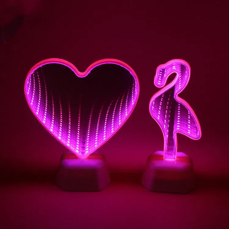 Plastic double-sided LED love tunnel light in rose red or dolphin colour, measuring 16cm long.