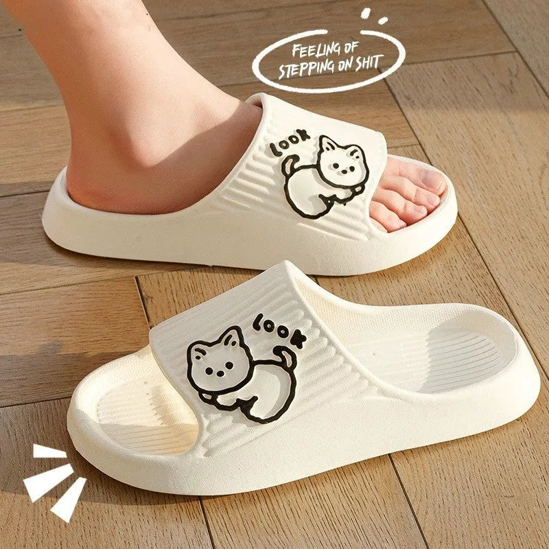 Women's green cat slippers with thick EVA platform sole, shown from above.