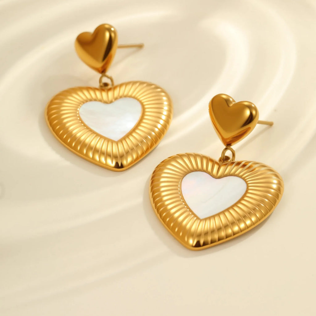 Gold heart-shaped stainless steel earrings with 18K electroplated finish for women's fashion wear