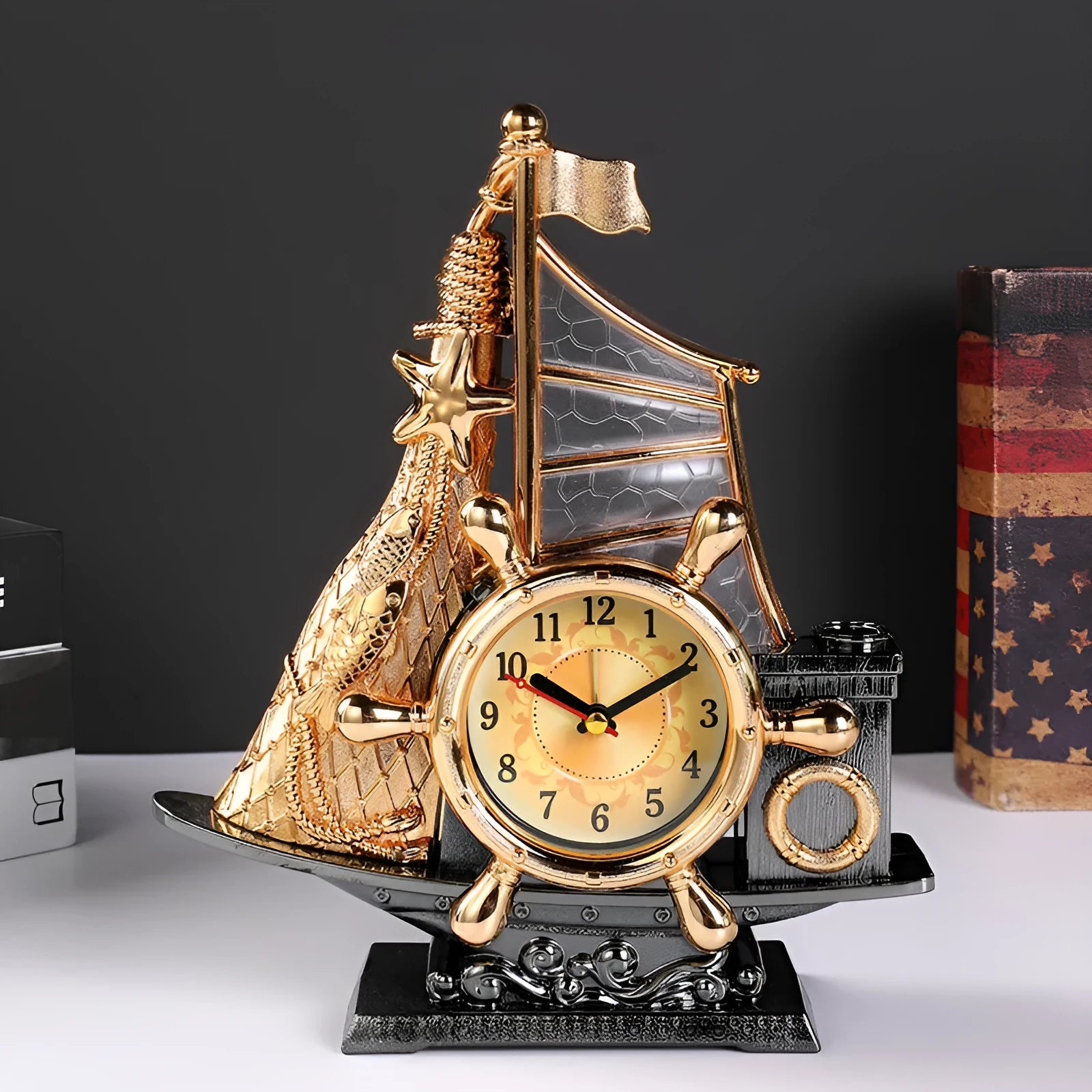 Creative contemporary alarm clock in a choice of gold or silver finish for home decor.